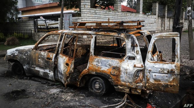 The remains of a burnt car which was set on fire by a mob during the violence after the assassination of Oromo's pop singer Hachalu Hundessa is seen in Shashamene, Ethiopia, July 12, 2020.