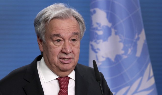 UN Secretary-General Antonio Guterres addresses the media during a joint press conference with German Foreign Minister Heiko Maas after a meeting in Berlin, Germany, Thursday, Dec. 17, 2020. (AP Photo/Michael Sohn, pool)